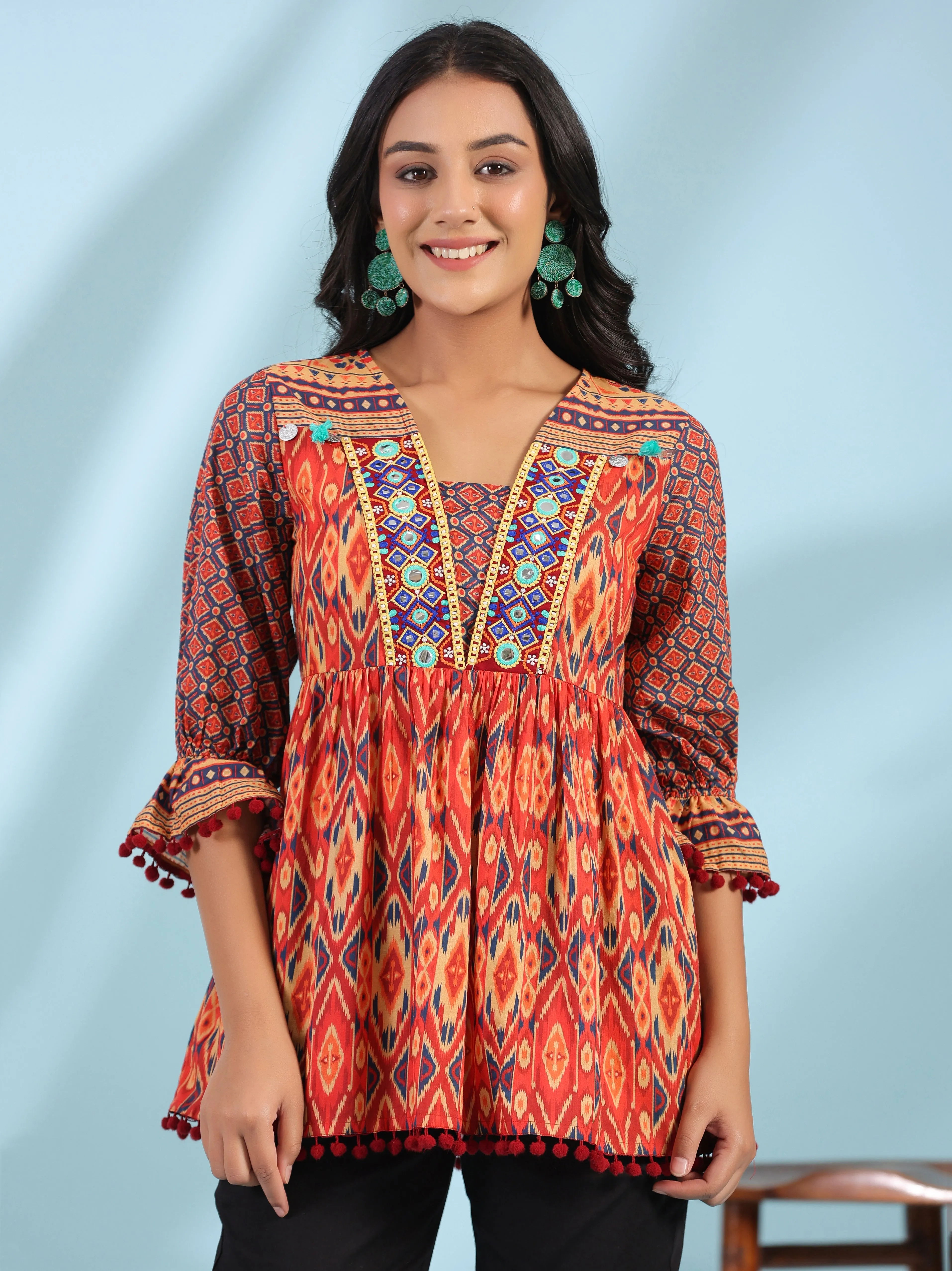 Jashvi Orange Ikat Printed Peplum Cotton Tunic With Mirror Work & Lace