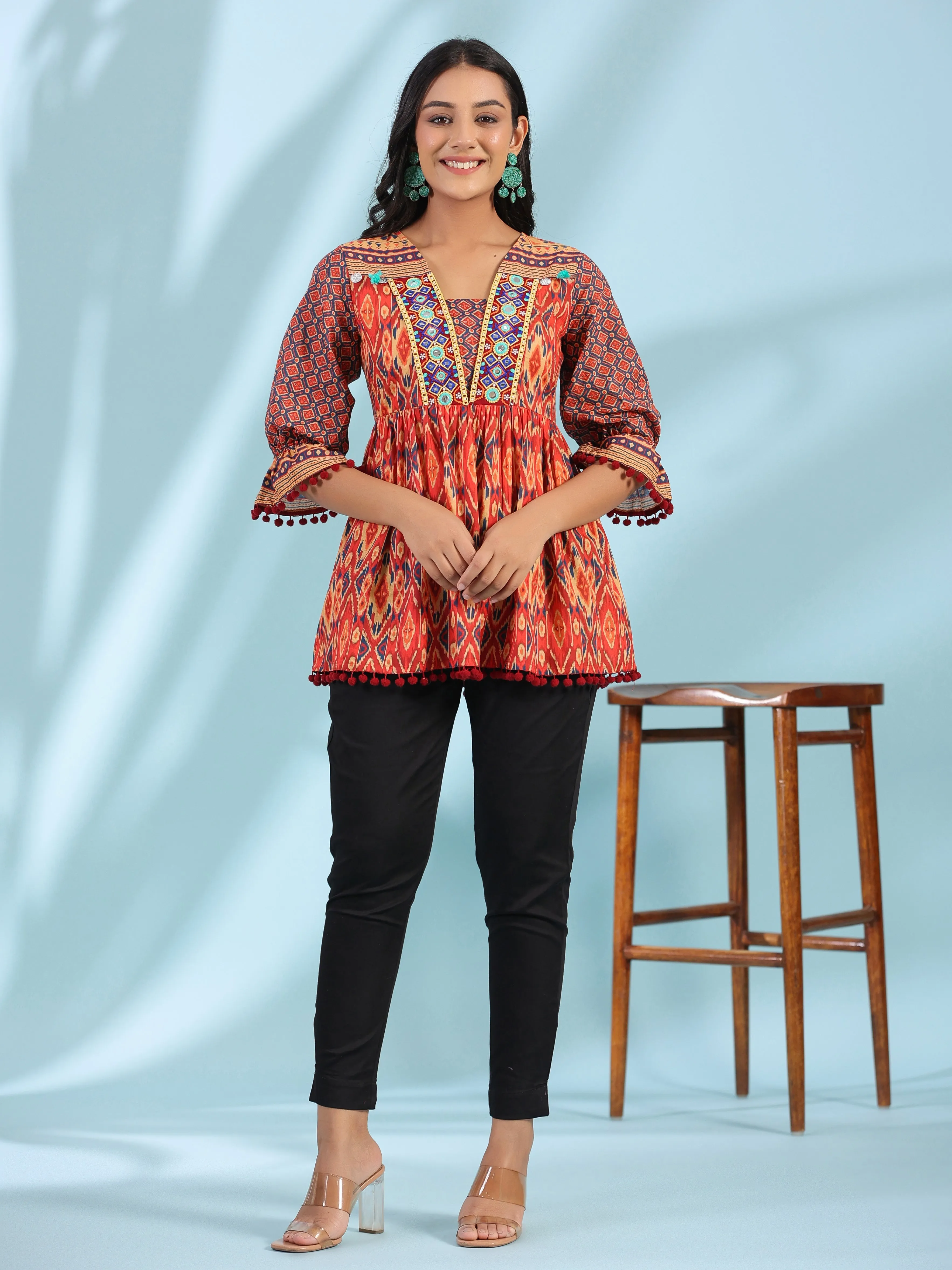 Jashvi Orange Ikat Printed Peplum Cotton Tunic With Mirror Work & Lace