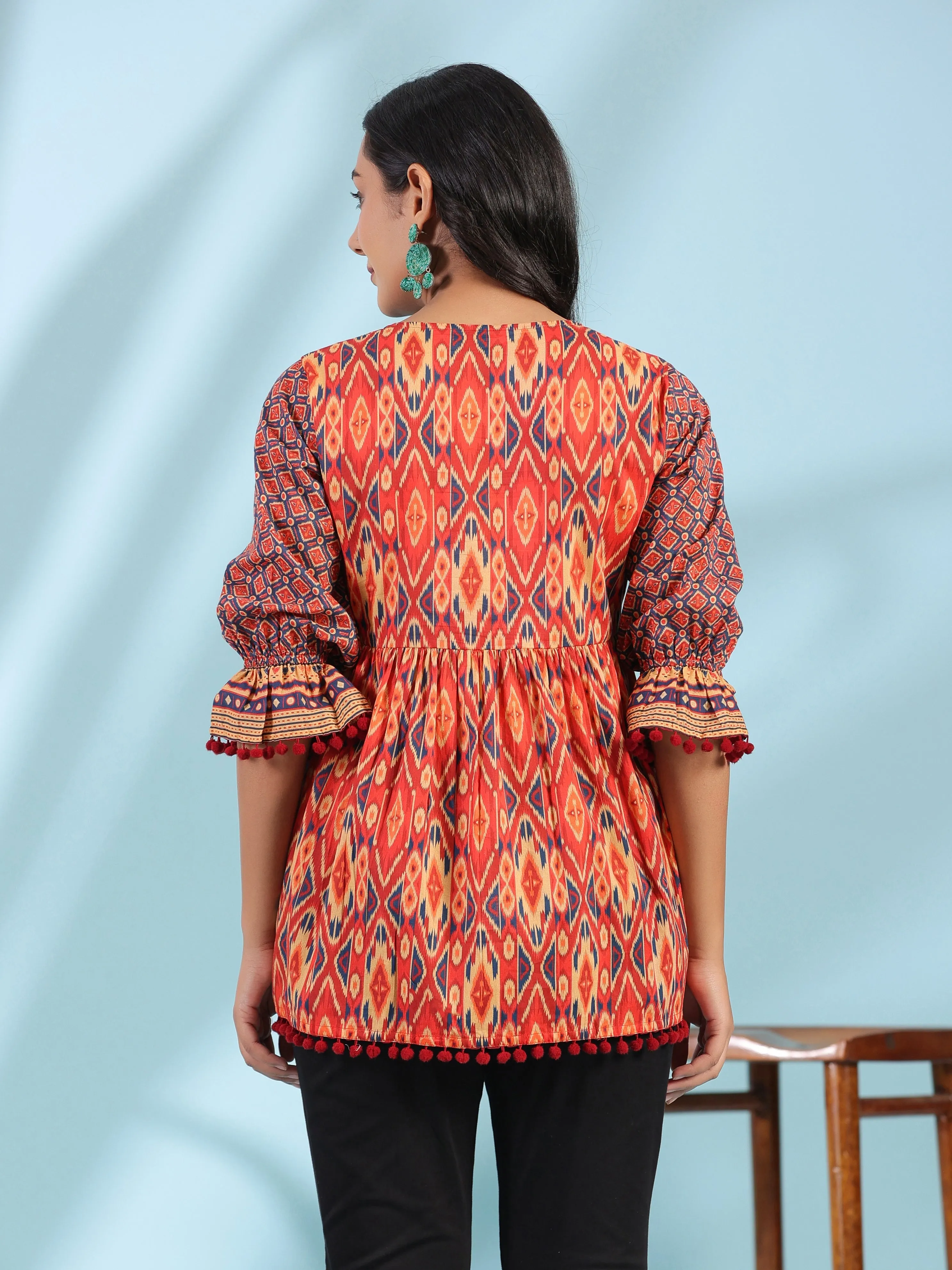 Jashvi Orange Ikat Printed Peplum Cotton Tunic With Mirror Work & Lace